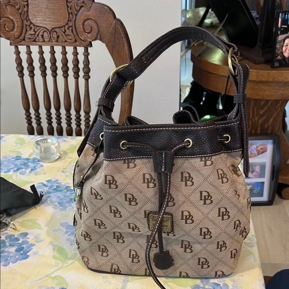 Dooney & Bourke Brown and Tan Shoulder Bag 10 x 12 x 6 drawstring closure - Picture 1 of 10